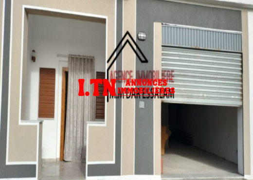 maison avec un garage à vendre