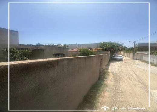 à vendre terrain cloturé
