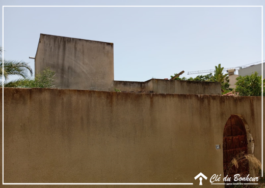 à vendre terrain cloturé