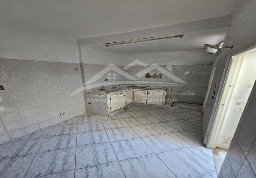 Un  appartement  rez de chaussée
