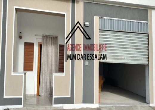maison avec un garage à vendre