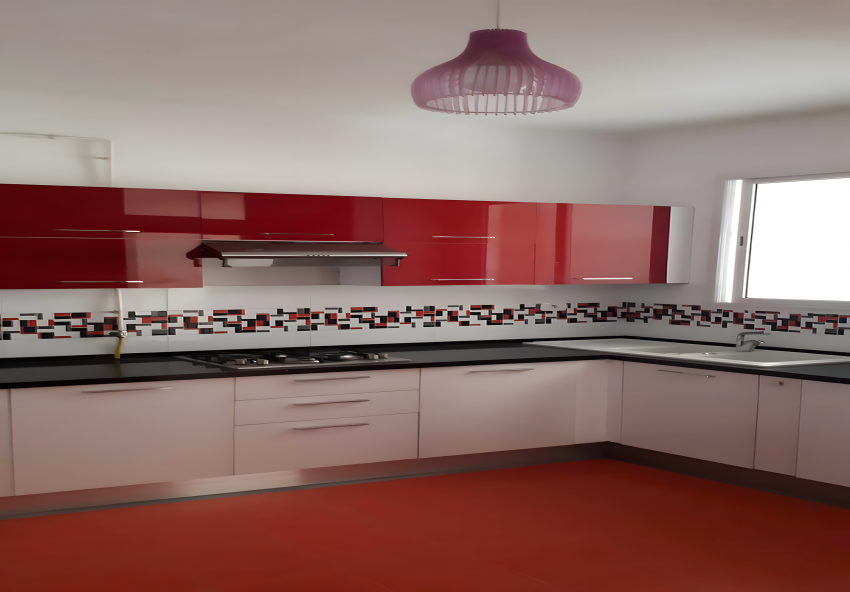 Appartement (S+2) au premier étage d’un immeuble (R+3)